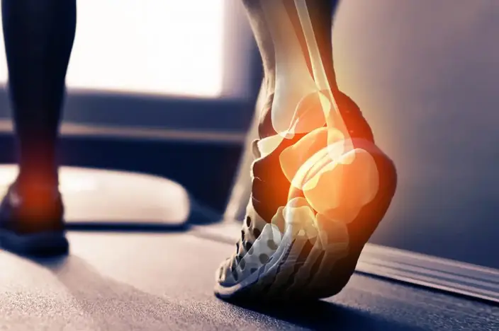 walking foot glowing with pain