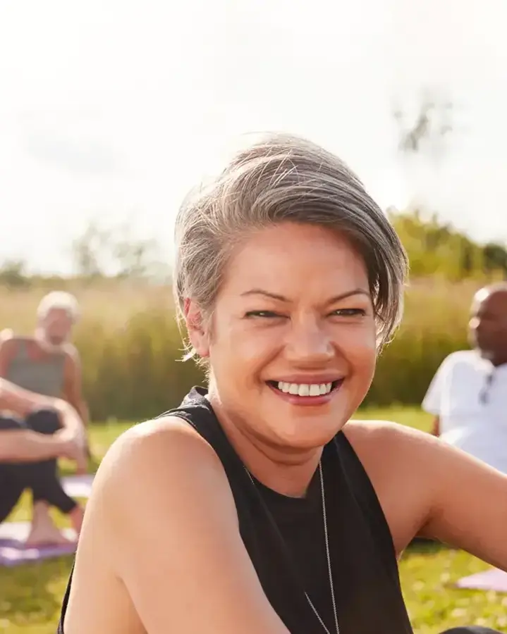 woman at outdoor yoga class