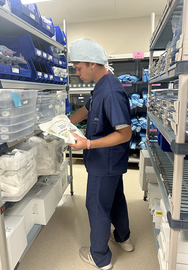 Student-Volunteer-with-surgical-supplies