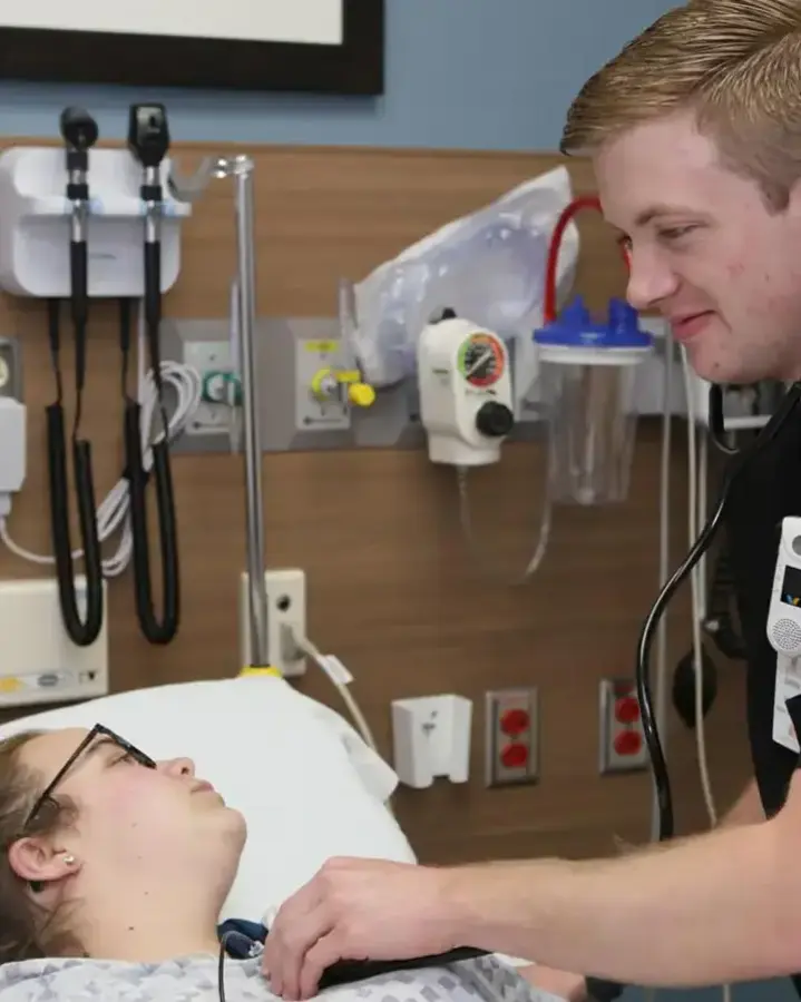student nurse with patient