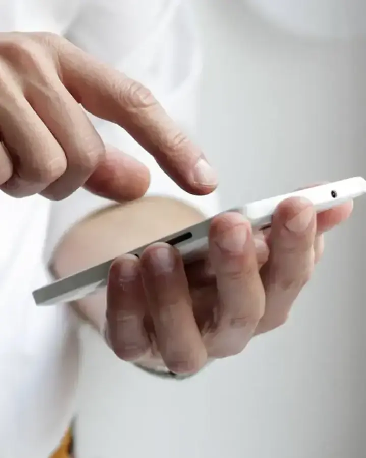 man using cell phone