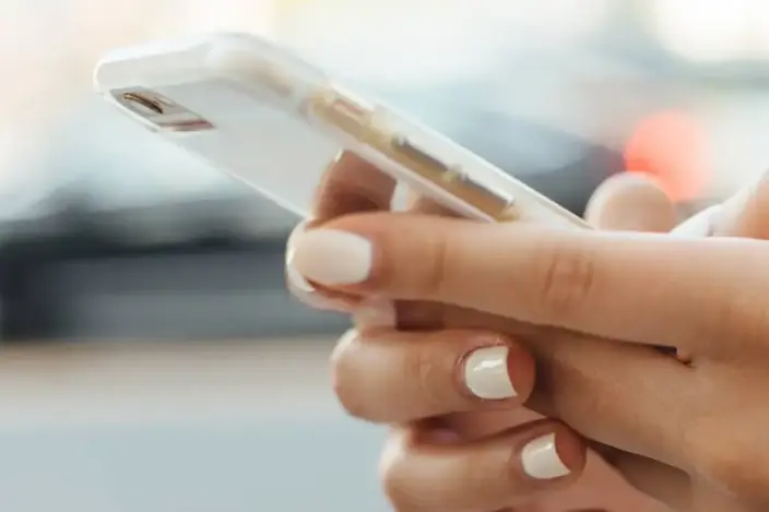 woman using her cell phone