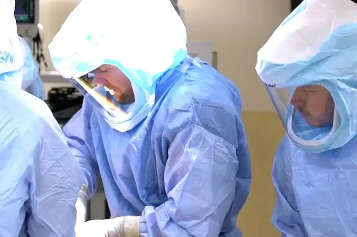 three doctors in surgery