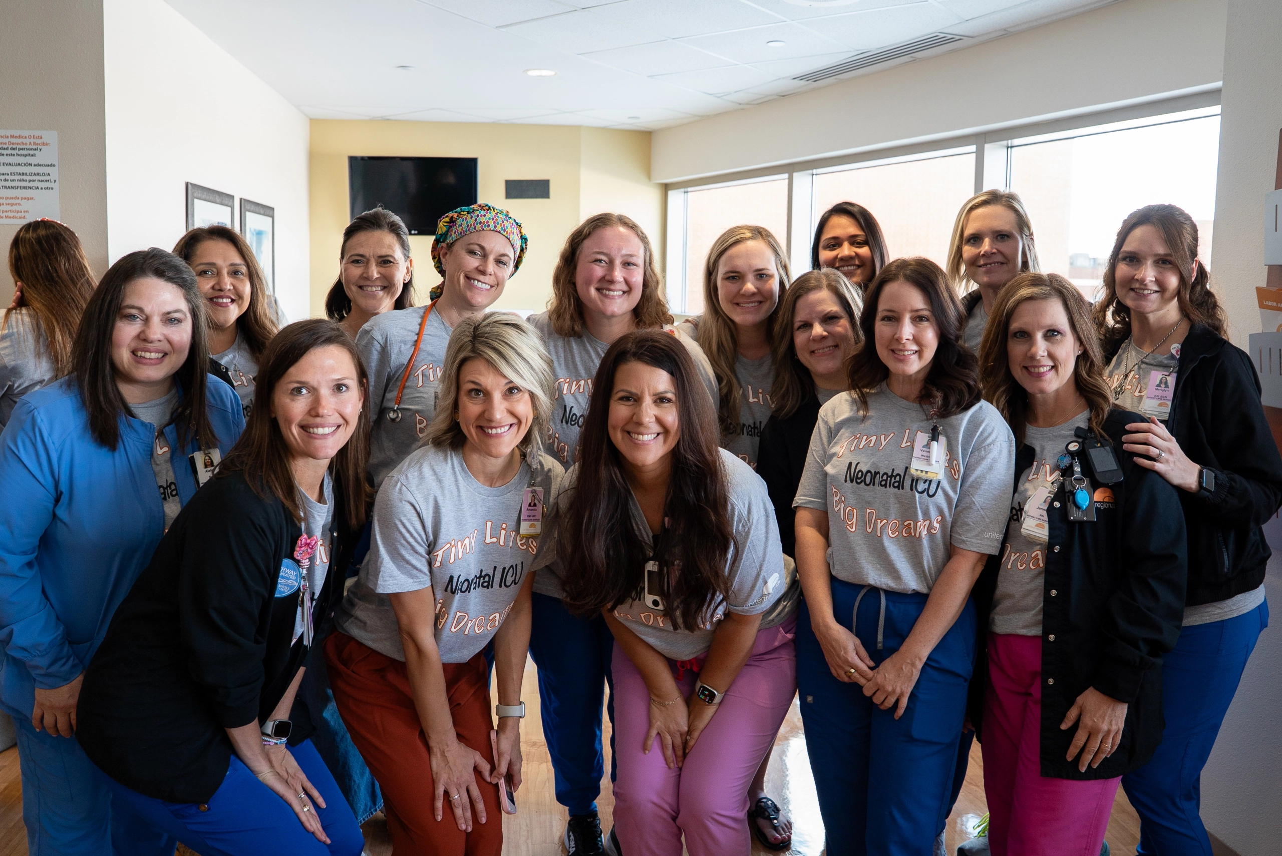 group-of-women-wearing-scrubs-and-smiling
