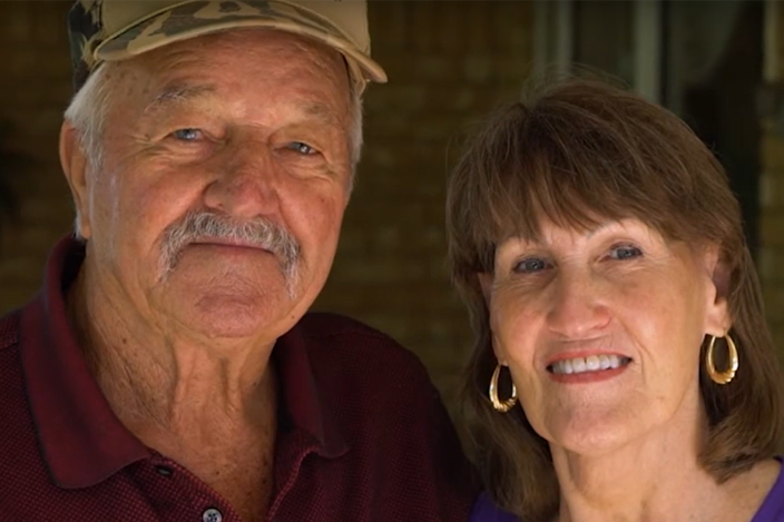 an-older-couple-smiling-portrait